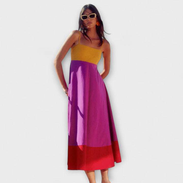 "Farveblok Spaghetti-Strop Kjole" can be rewritten as "Farveblok Spaghetti-Strap Kjole".