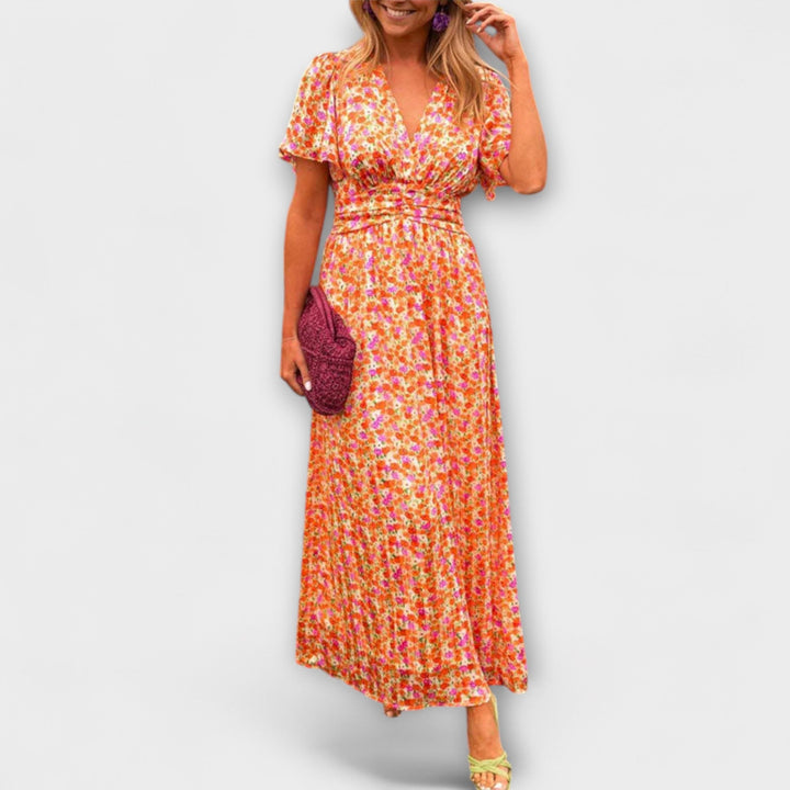 "Elsie - Klassisk V-hals Kjole" can be rewritten as "Elsie - Tideless V-Hals Kjole".