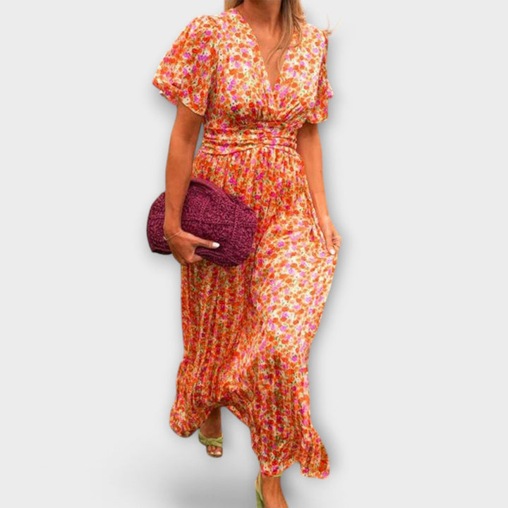 "Elsie - Klassisk V-hals Kjole" can be rewritten as "Elsie - Tideless V-Hals Kjole".