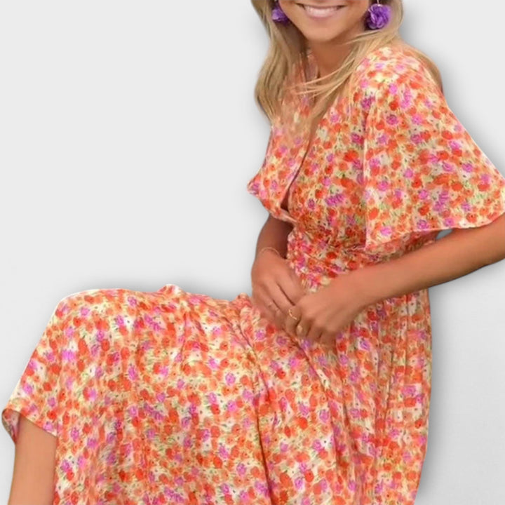 "Elsie - Klassisk V-hals Kjole" can be rewritten as "Elsie - Tideless V-Hals Kjole".