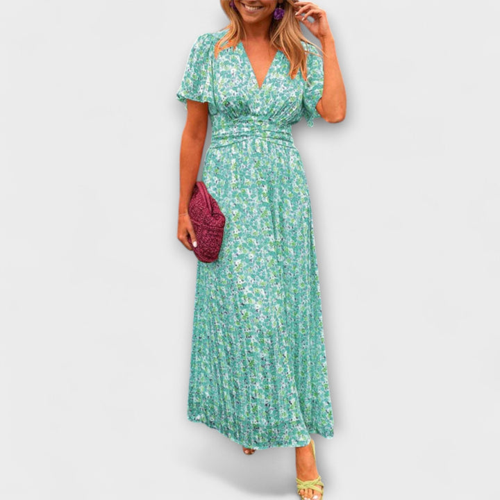 "Elsie - Klassisk V-hals Kjole" can be rewritten as "Elsie - Tideless V-Hals Kjole".